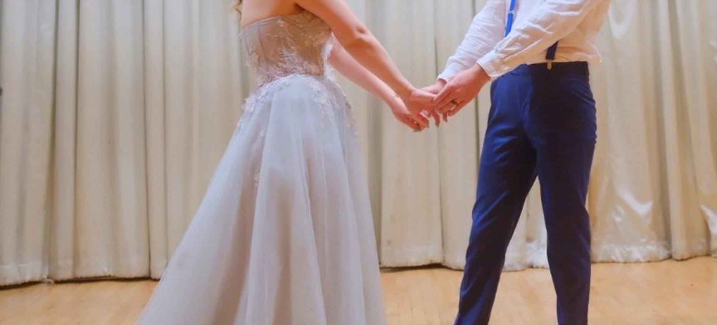 Bride and groom posing with Starry Night Photo Booth backdrop
