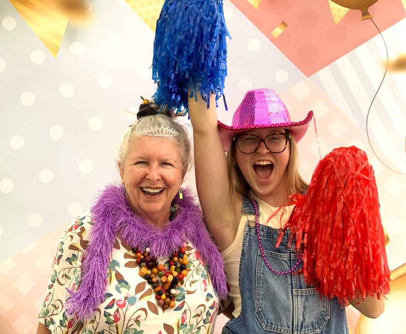 Guests laughing and celebrating in Starry Night Photo Booth